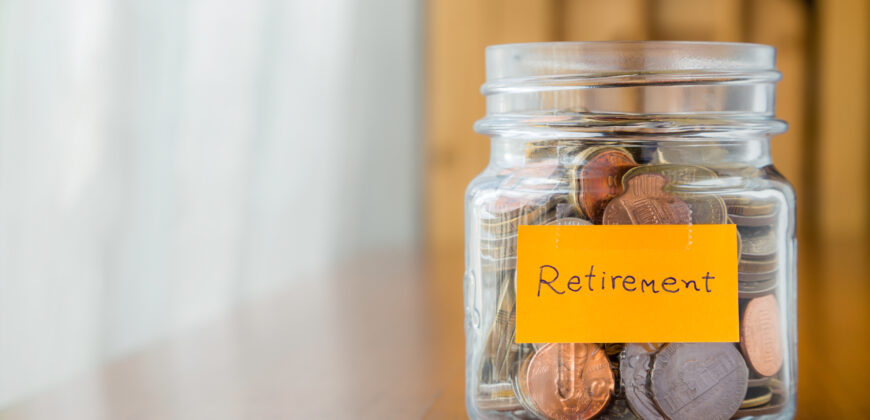 Jar with coins in it saving for retirement